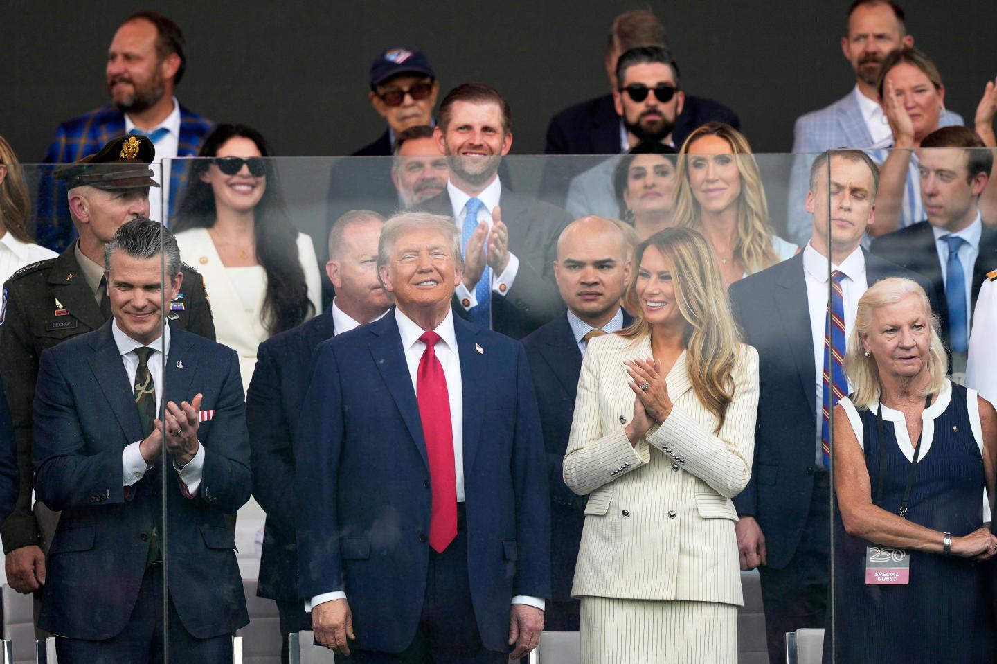 Military parade kicks off early amid rainfall as Trump looks on and brushes off ‘No Kings’ protests