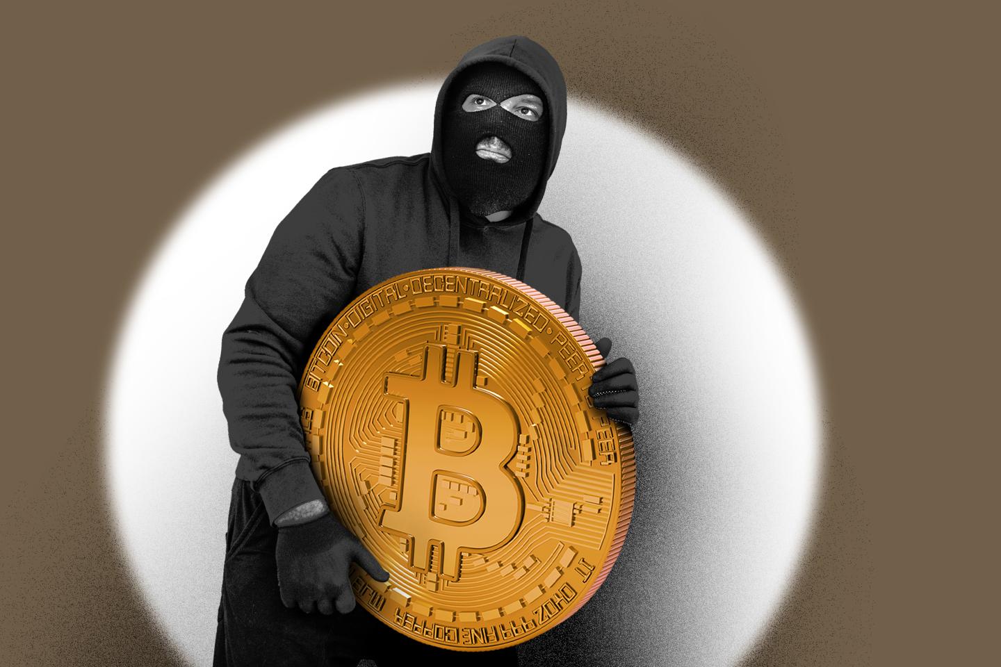 One man, male criminal dressed all in black, carrying stolen Bitcoin
