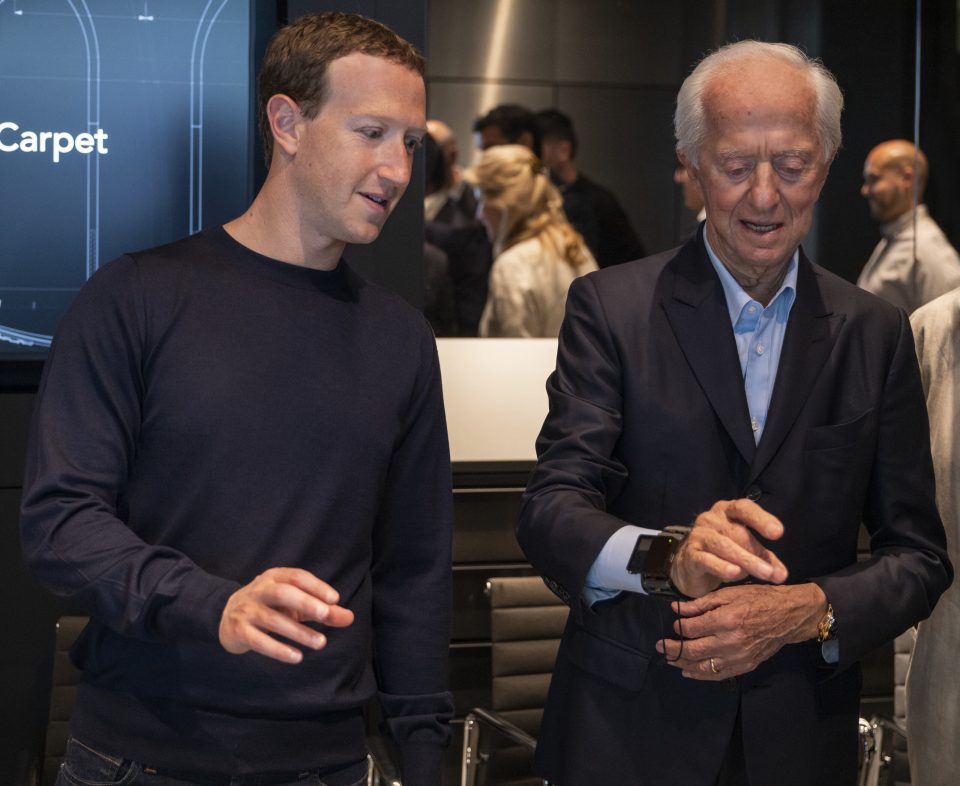 Mark Zuckerberg stands alongside Leonardo Del Vecchio.