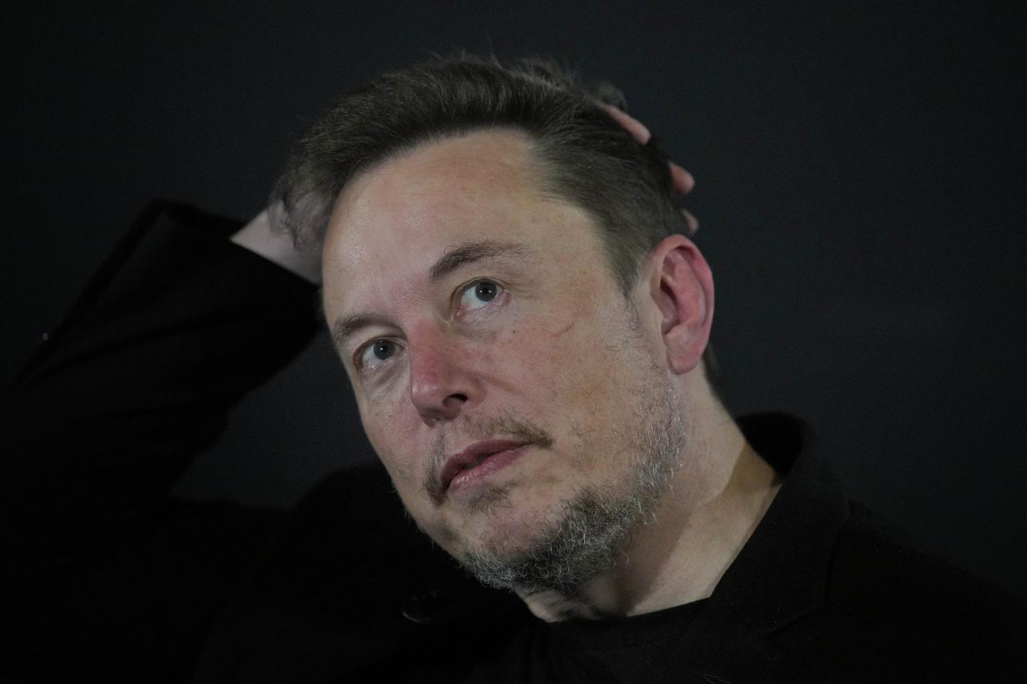 Tesla and SpaceX's CEO Elon Musk reacts during an in-conversation event with British Prime Minister Rishi Sunak at Lancaster House on November 2, 2023 in London, England.