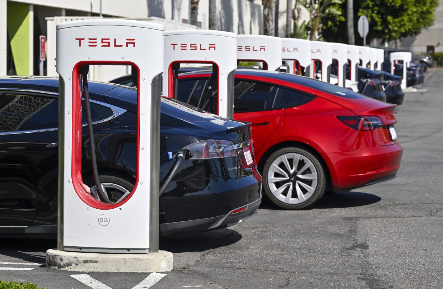 Teslas at a charging station