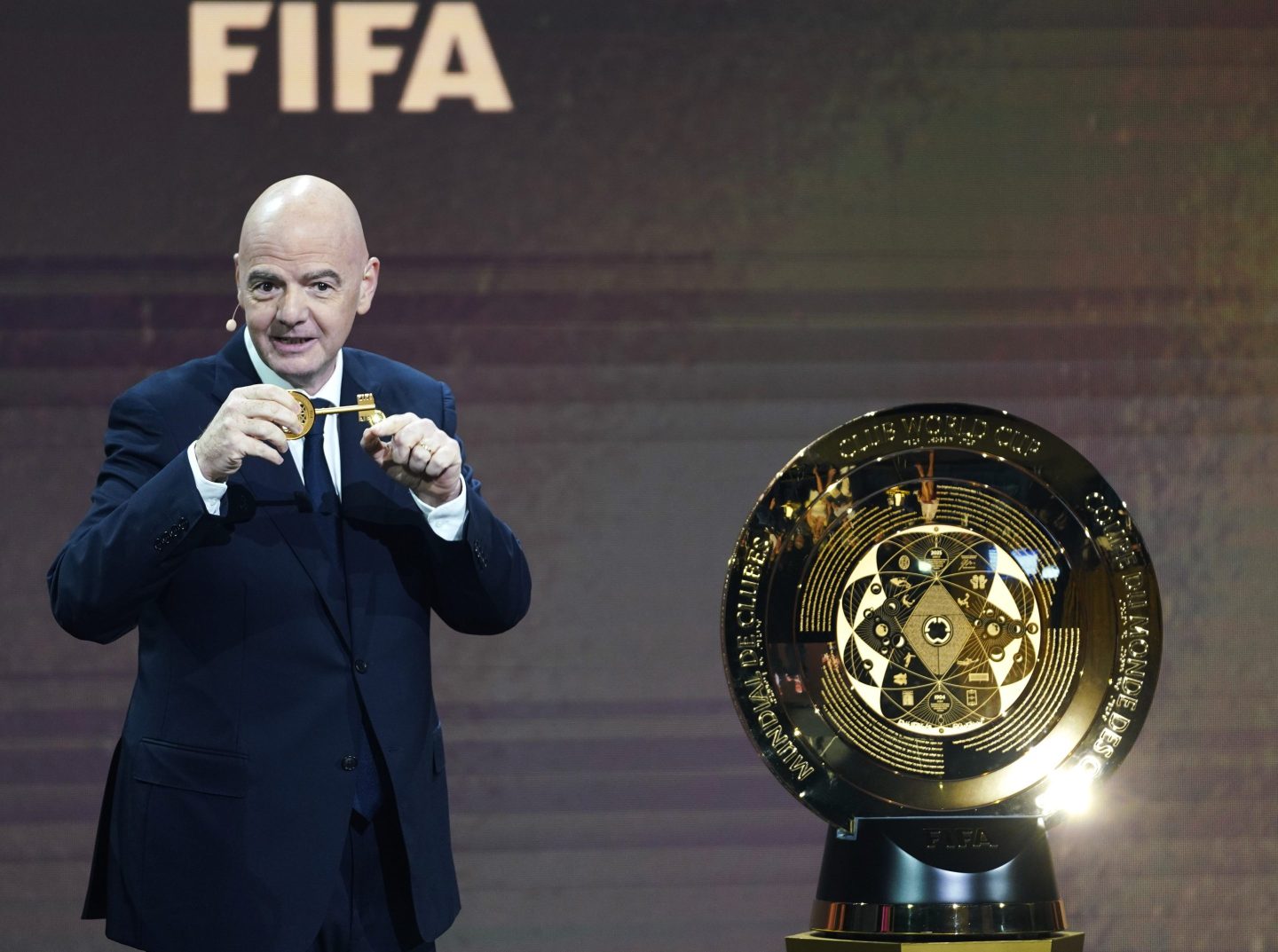 Fifa President Gianni Infantino and the Club World Cup Trophy