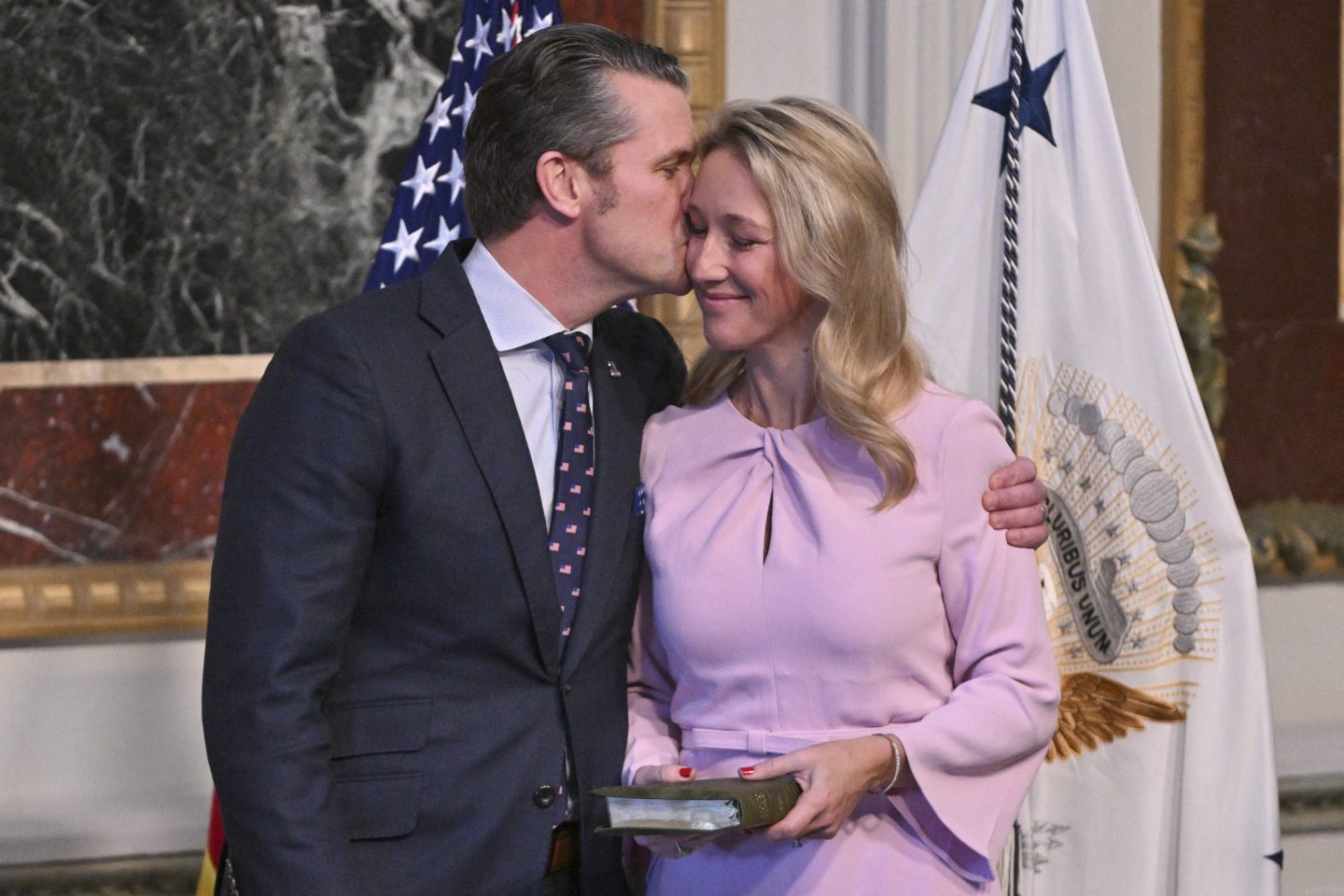 Pete Hegseth kisses his wife, Jennifer