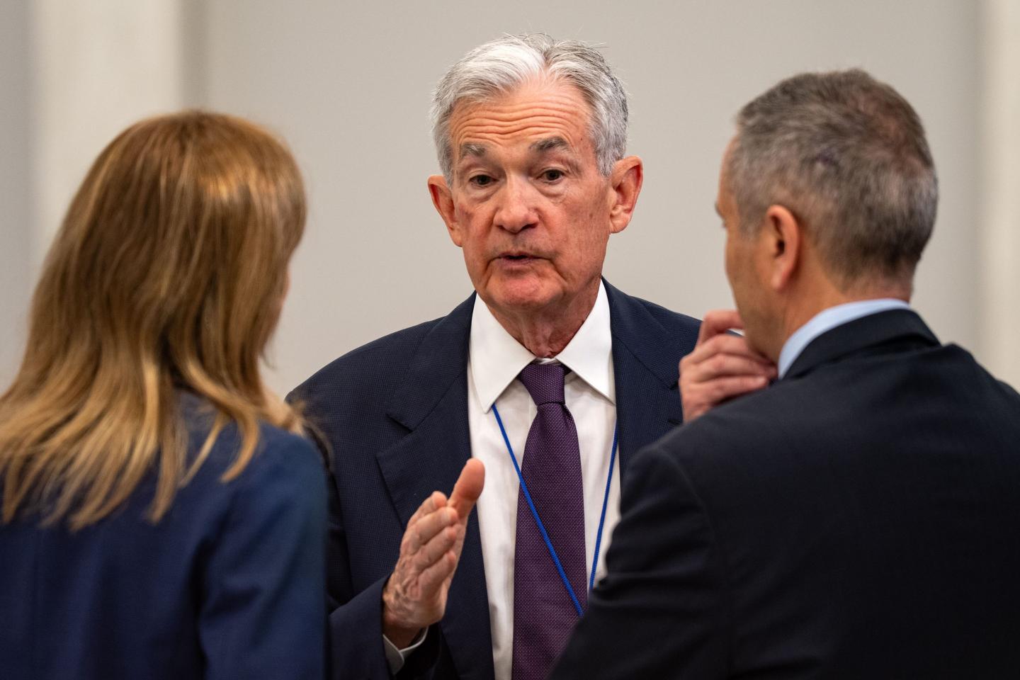 Jerome Powell, chairman of the US Federal Reserve, speaks with attendees at the Thomas Laubach Research Conference in Washington, DC, US, on Thursday, May 15, 2025