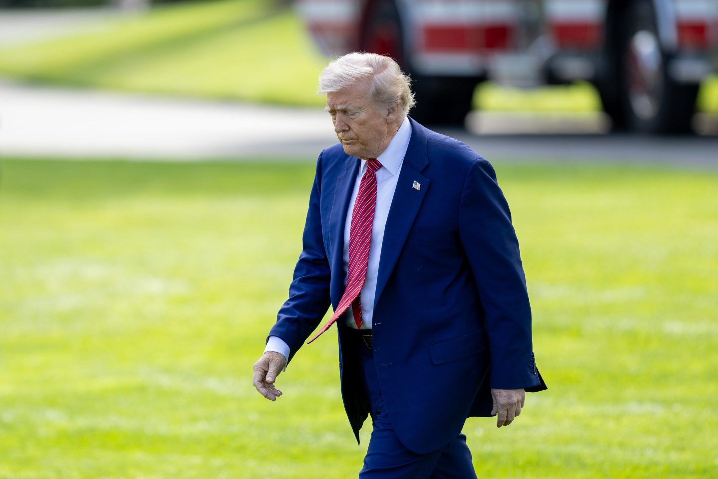 U.S. President Donald Trump walks to board Marine One