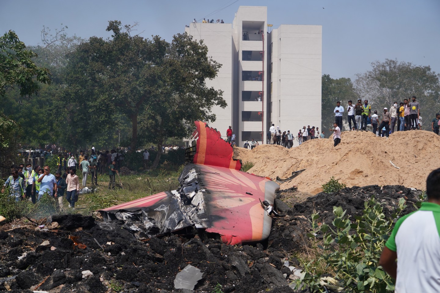 An Air India plane bound for London crashed in a residential area of Ahmedabad shortly after takeoff Thursday, killing 241 people on board, the airline said.