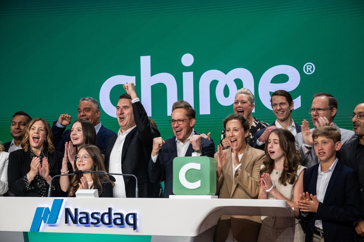 Ryan King, co-founder of Chime Financial Inc., center left, and Chris Britt, cofounder and chief executive officer of Chime Financial Inc., center, during the company's initial public offering at the Nasdaq