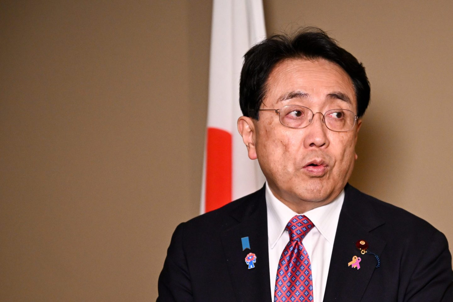 Ryosei Akazawa, Japan's economic revitalization minster, speaks to members of the media in Washington, DC, US, on Friday, June 13, 2025.