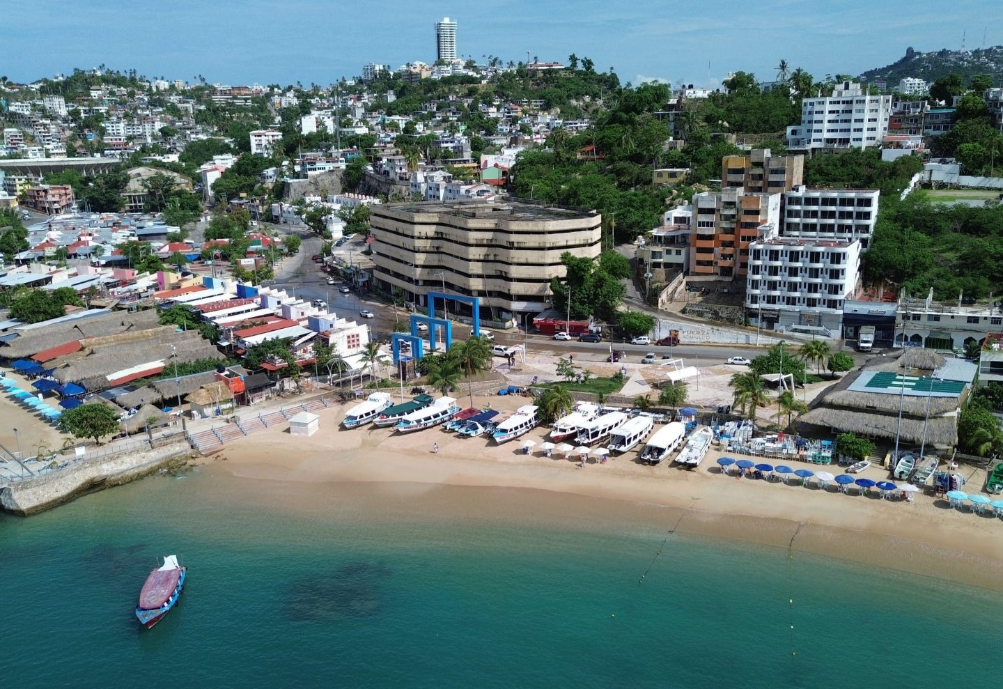 Aerial view of an almost empty beach before the arrival of Hurricane Erick at Manzanillo Beach in Acapulco, Guerrero State, Mexico, on June 18, 2025.