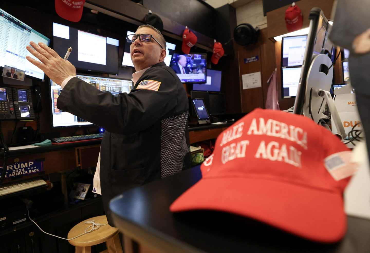 A trader works on the floor of the New York Stock Exchange on June 23.