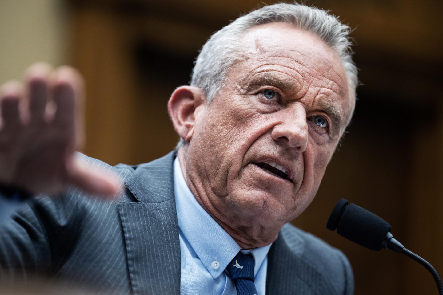 RFK Jr. gesticulates in a hearing