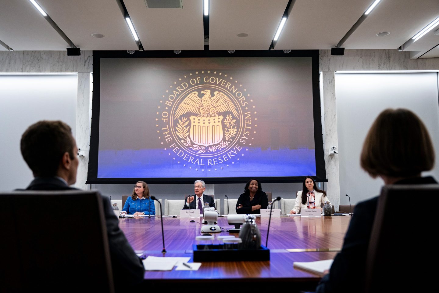 Michelle Bowman, vice chair for supervision at the US Federal Reserve, Jerome Powell, chairman of the US Federal Reserve, Lisa Cook, governor of the US Federal Reserve, and Adriana Kugler, governor of the US Federal Reserve, left to right, during the Federal Reserve Board open meeting in Washington, DC, US, on Wednesday, June 25, 2025.