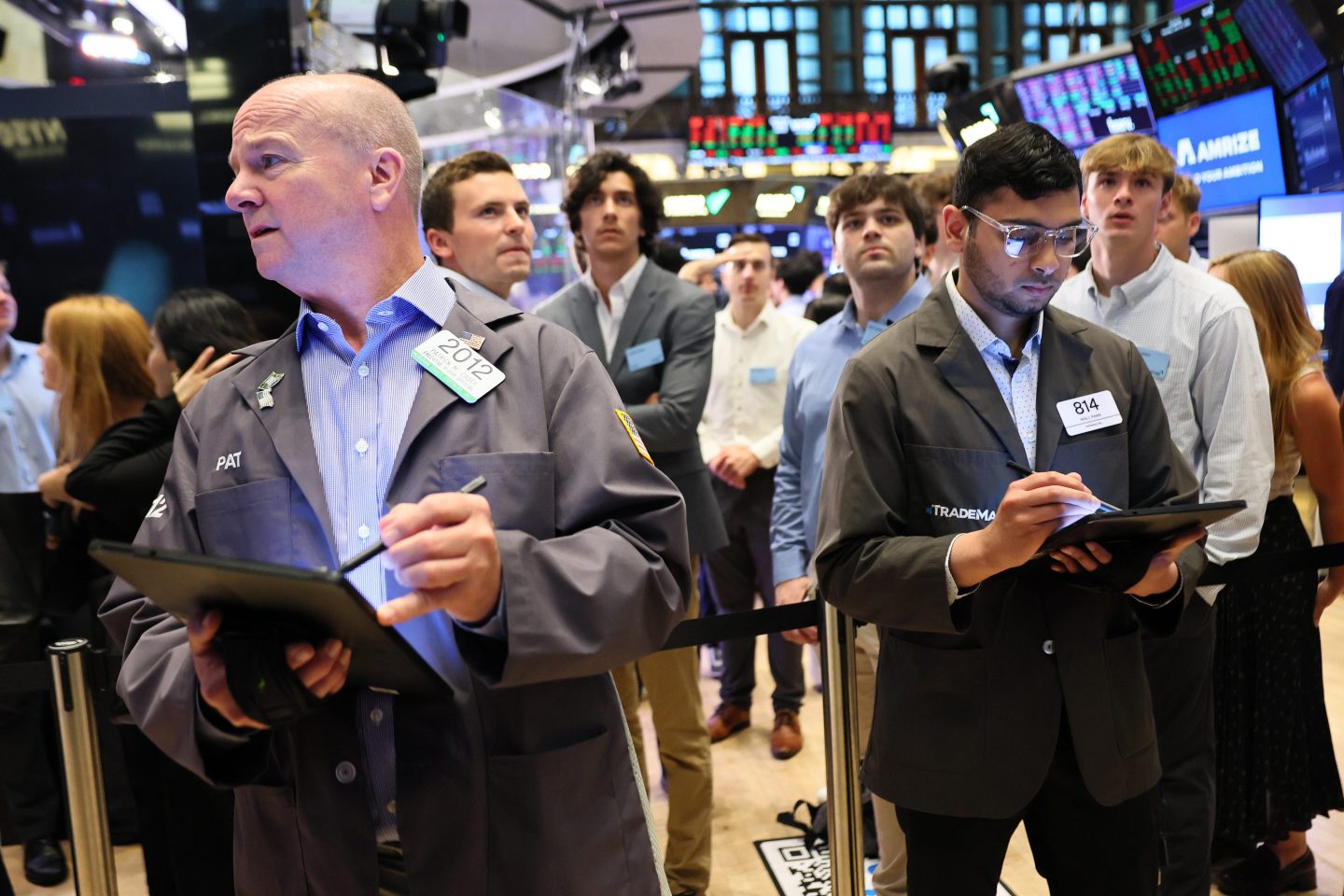 Traders work on the floor of the New York Stock Exchange during morning trading on June 23.