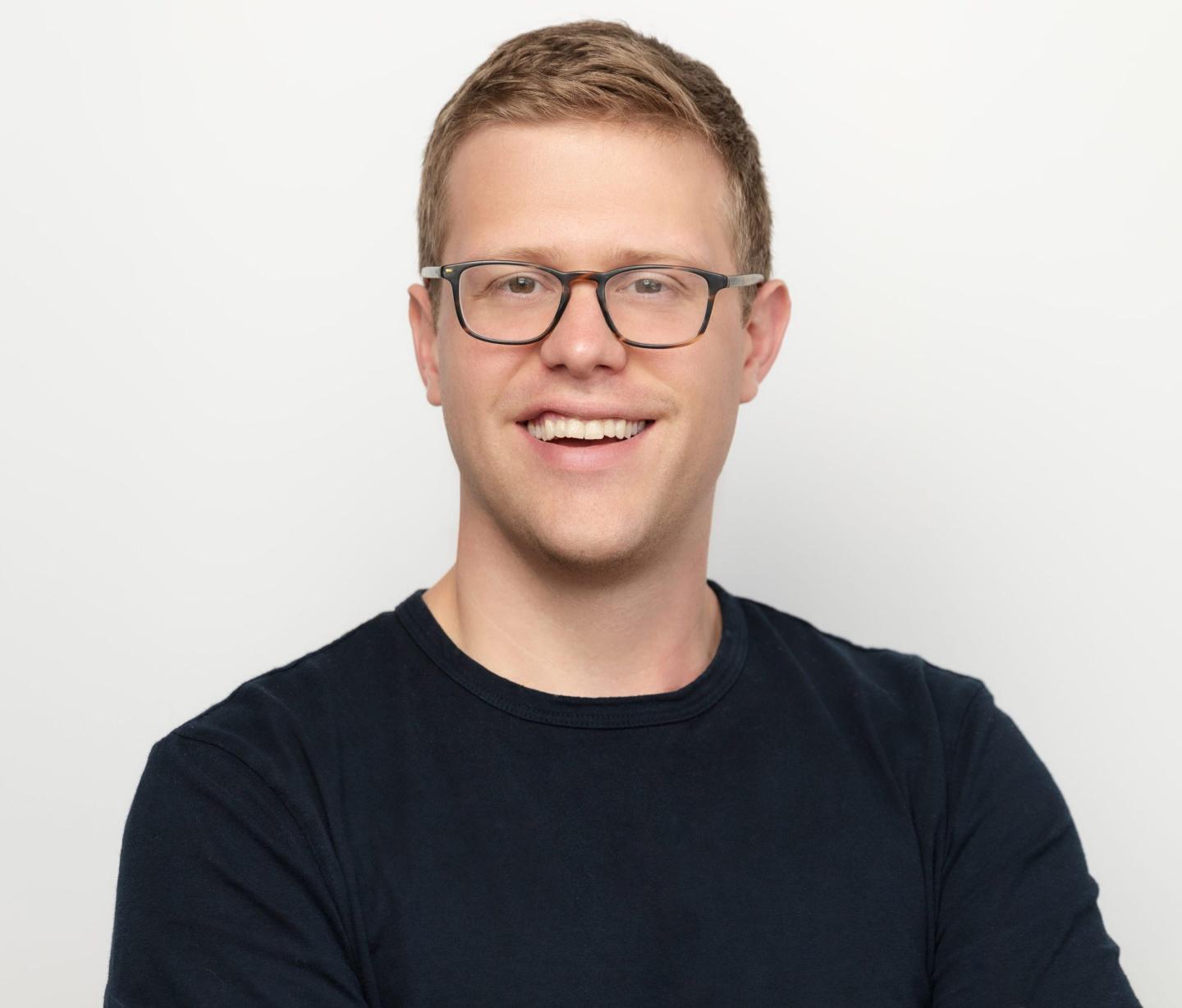 headshot of whatnot co-founder and ceo Grant LaFontaine with a big smile on his face