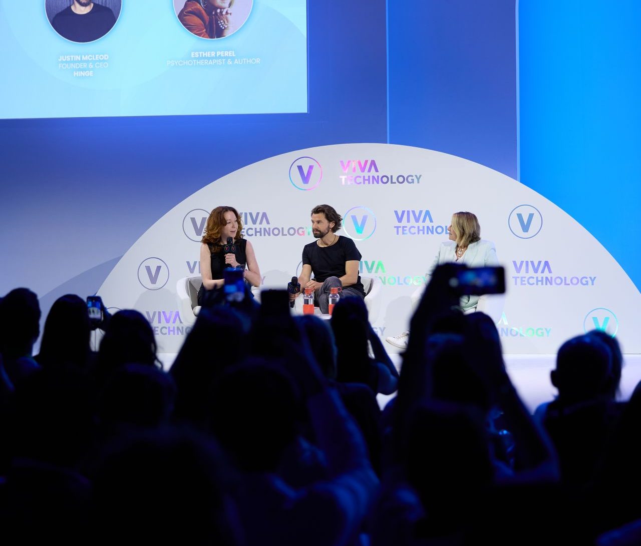 Fortune's Beatrice Nolan and Hinge's McLeod sitting and talking on a blue stage at Vivatech.