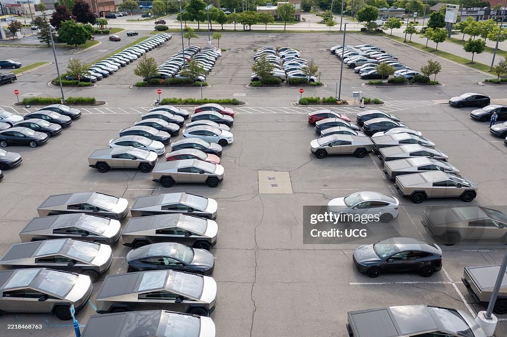 Tesla Cybertrucks parked in a car park.