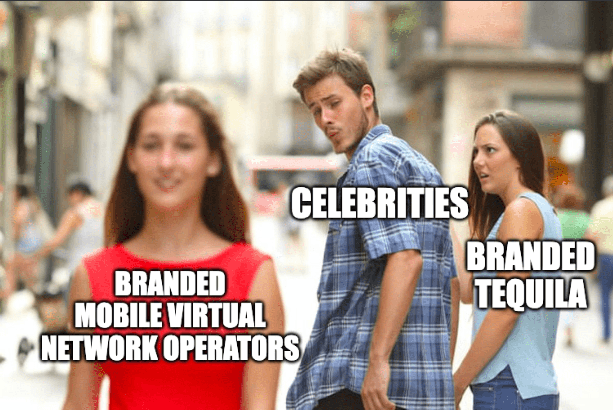 A meme of a man labeled "celebrities" walking with a girlfriend labeled "branded tequila" and distracted by a passing woman labeled "branded mobile virtual network operators"