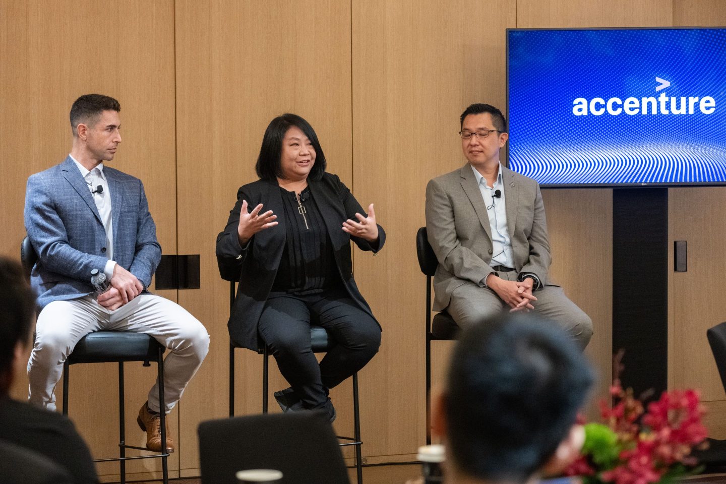 From left: Ramine Tinati, APAC Center for Advanced AI lead at Accenture; May Yap, chief information officer at Jabil; and Chee Wee Ang, chief AI officer at Singapore’s Home Team Science and Tech Agency, speaking at Brainstorm AI Singapore on July 23, 2025.