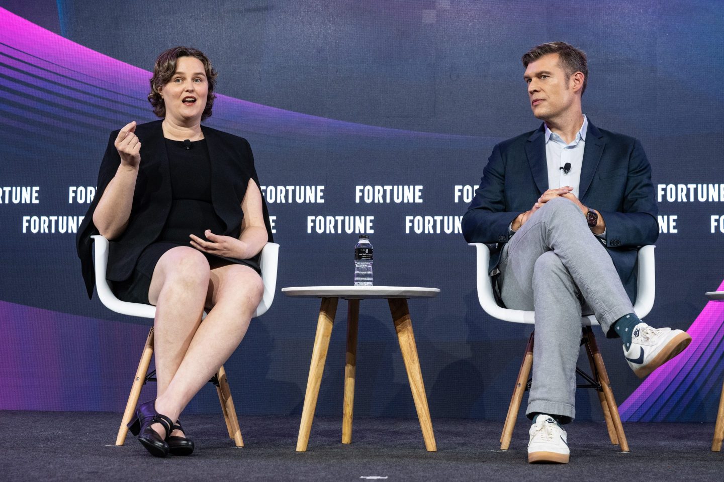 Anthea Roberts, founder and CEO of Dragonfly Thinking (left), and Russell Wald, executive director of the Stanford Institute for Human-Centered AI, speaking at Fortune Brainstorm AI Singapore on July 23, 2025.