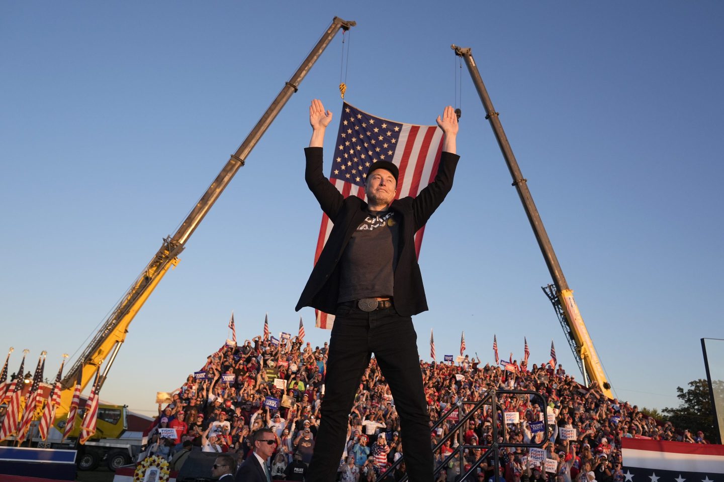 Tesla and SpaceX CEO Elon Musk walks to the stage to speak at the Butler Farm Show, Oct. 5, 2024, in Butler, Pa.