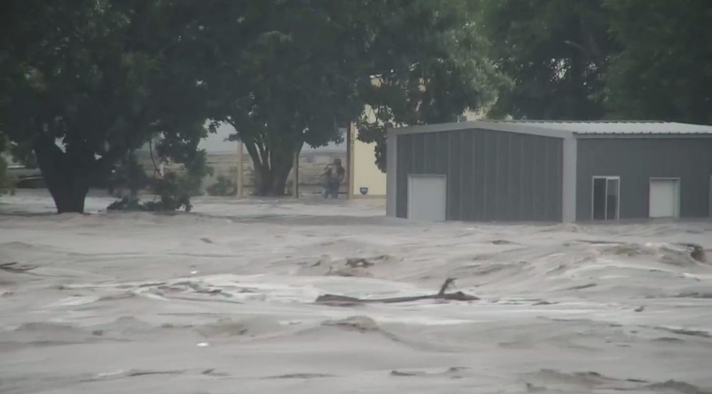 Water rises from severe flooding along the Guadalupe River in Kerr County, Texas on Friday.