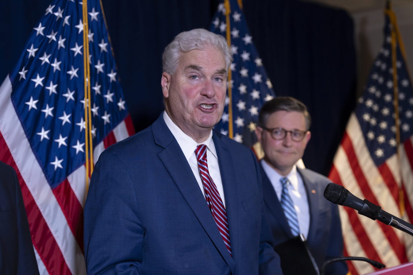 House Majority Whip Tom Emmer, R-Minn., left, joined at right by Speaker of the House Mike Johnson, R-La., discusses crypto legislation during a news conference at the Republican National Committee headquarters in Washington, on July 15, 2025.