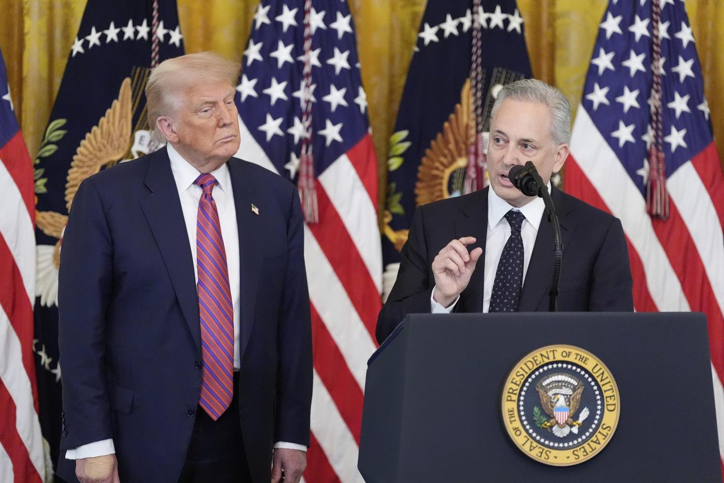 White House AI and crypto czar David Sacks speaks as President Donald Trump listens at an event for the signing of the GENIUS Act, a bill that regulates stablecoins, a type of cryptocurrency, in the East Room of the White House, on July 18, 2025, in Washington. 