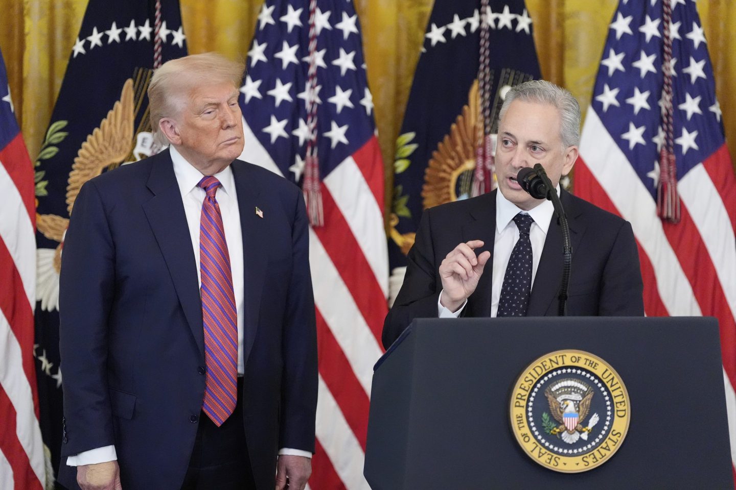 White House AI and crypto czar David Sacks speaks as President Donald Trump listens at an event for the signing of the GENIUS Act, a bill that regulates stablecoins, a type of cryptocurrency, in the East Room of the White House, on July 18, 2025, in Washington.