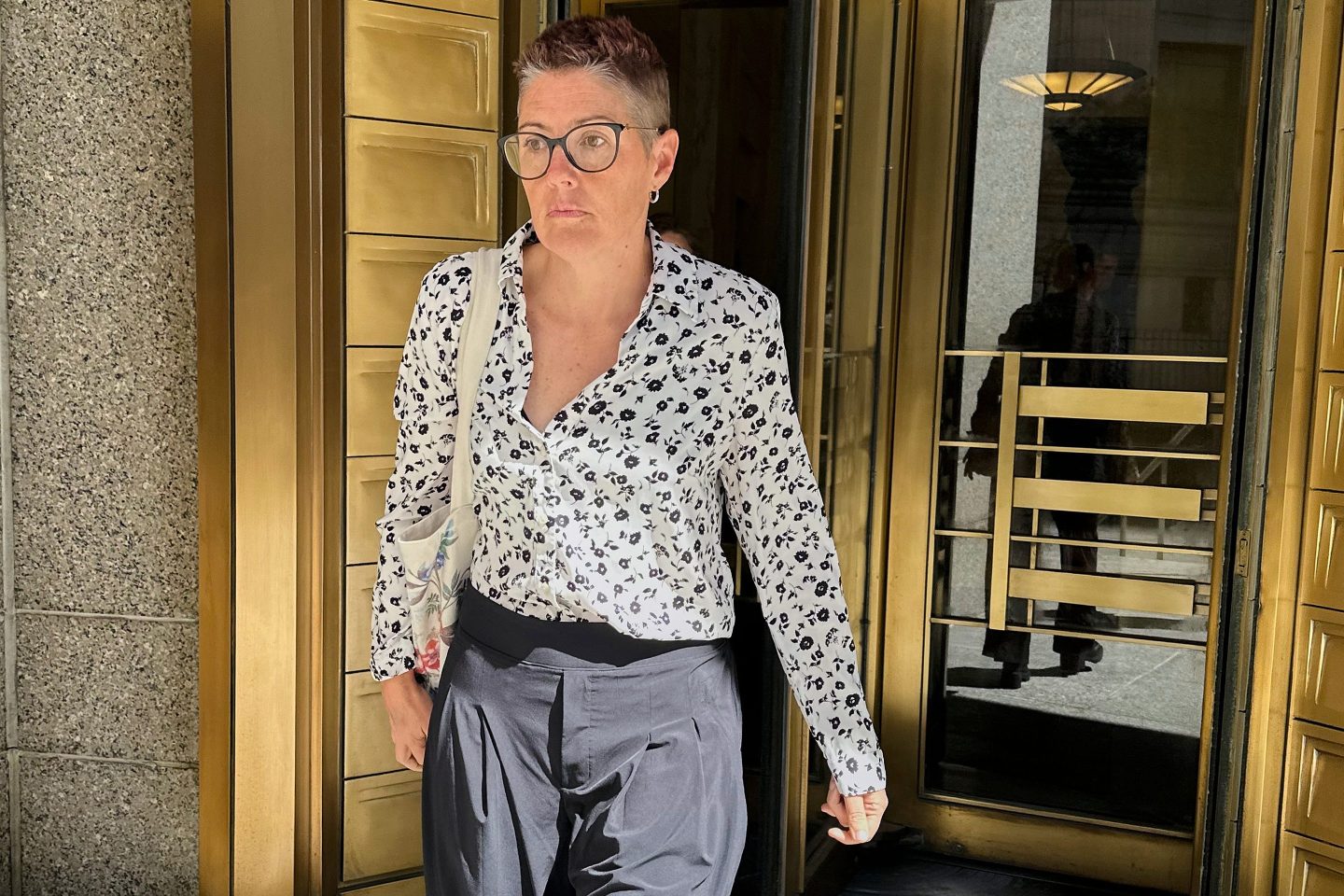 Christine Hunsicker, former CEO of fashion startup CaaStle Inc., leaves Manhattan federal court in New York on Friday, after pleading not guilty to charges alleging she cheated investors out of more than $300 million since 2019.