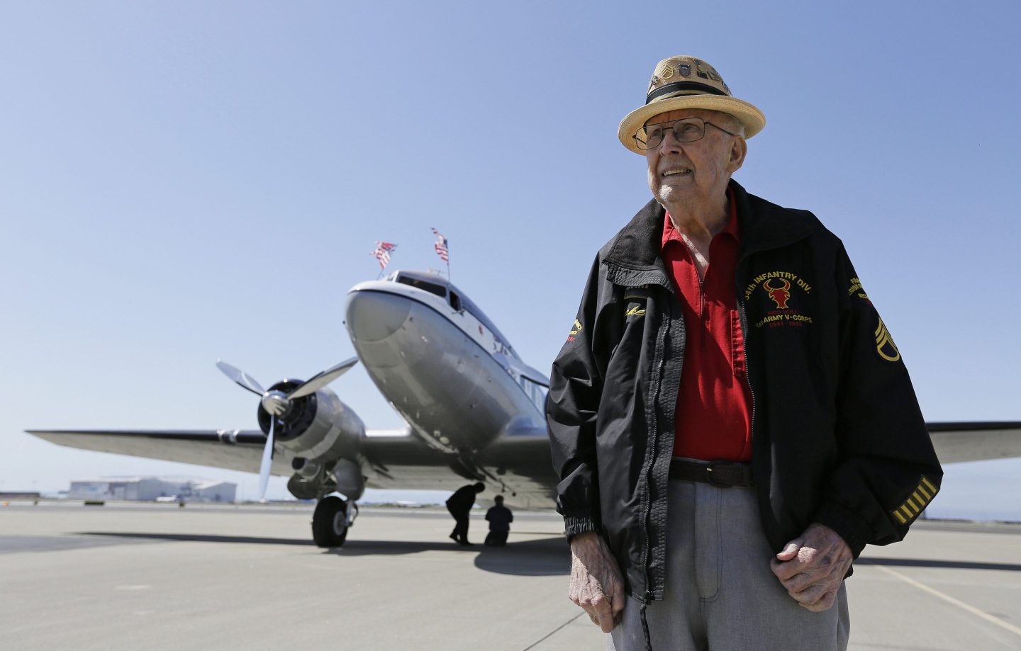 D-Day veteran Jake Larson poses before going for a ride in the "The Spirit of Benovia" World War II-era aircraft in Oakland, on April 29, 2019.