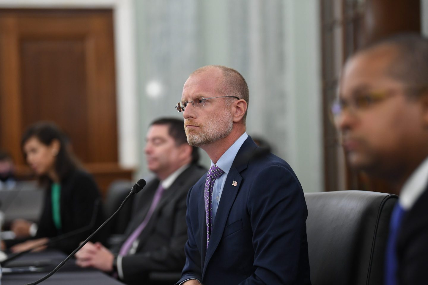 Brendan Carr listens during a Senate Commerce, Science, and Transportation committee hearing to examine the Federal Communications Commission on Capitol Hill in Washington, June 24, 2020.