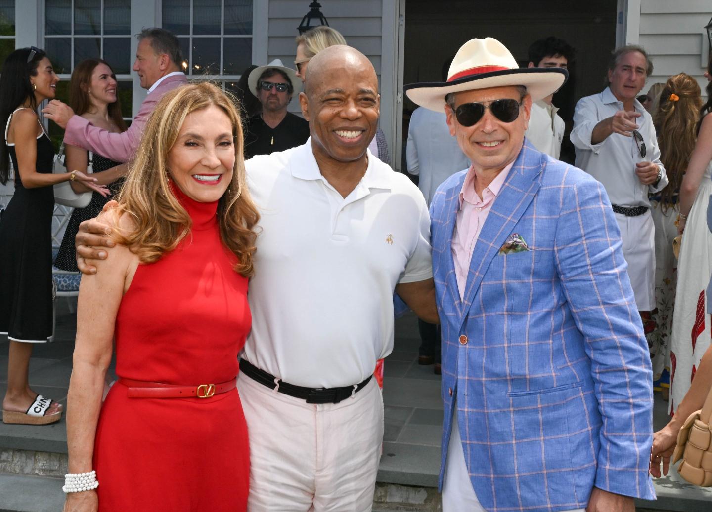 Maria Fishel, Mayor Eric Adams, and Ken Fishel smiling