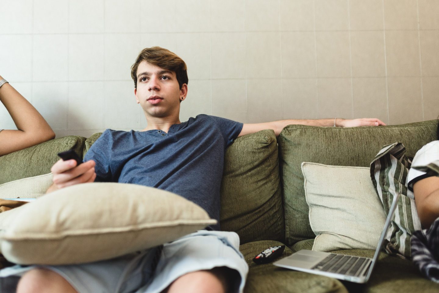 In-office employees work nearly 2 days more weekly than their remote counterparts, as staffers binge-watch TV and fake keyboard activity from home. Men are the worst-offenders.