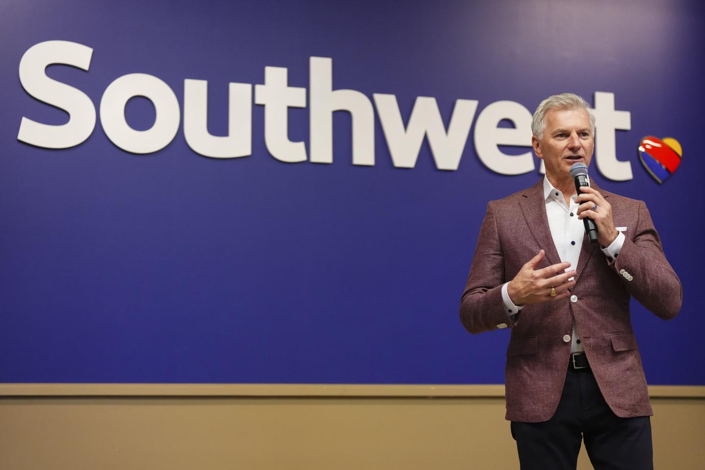 Southwest’s CEO says he picks up trash and serves snacks when flying and shares advice from the airline’s legendary cofounder