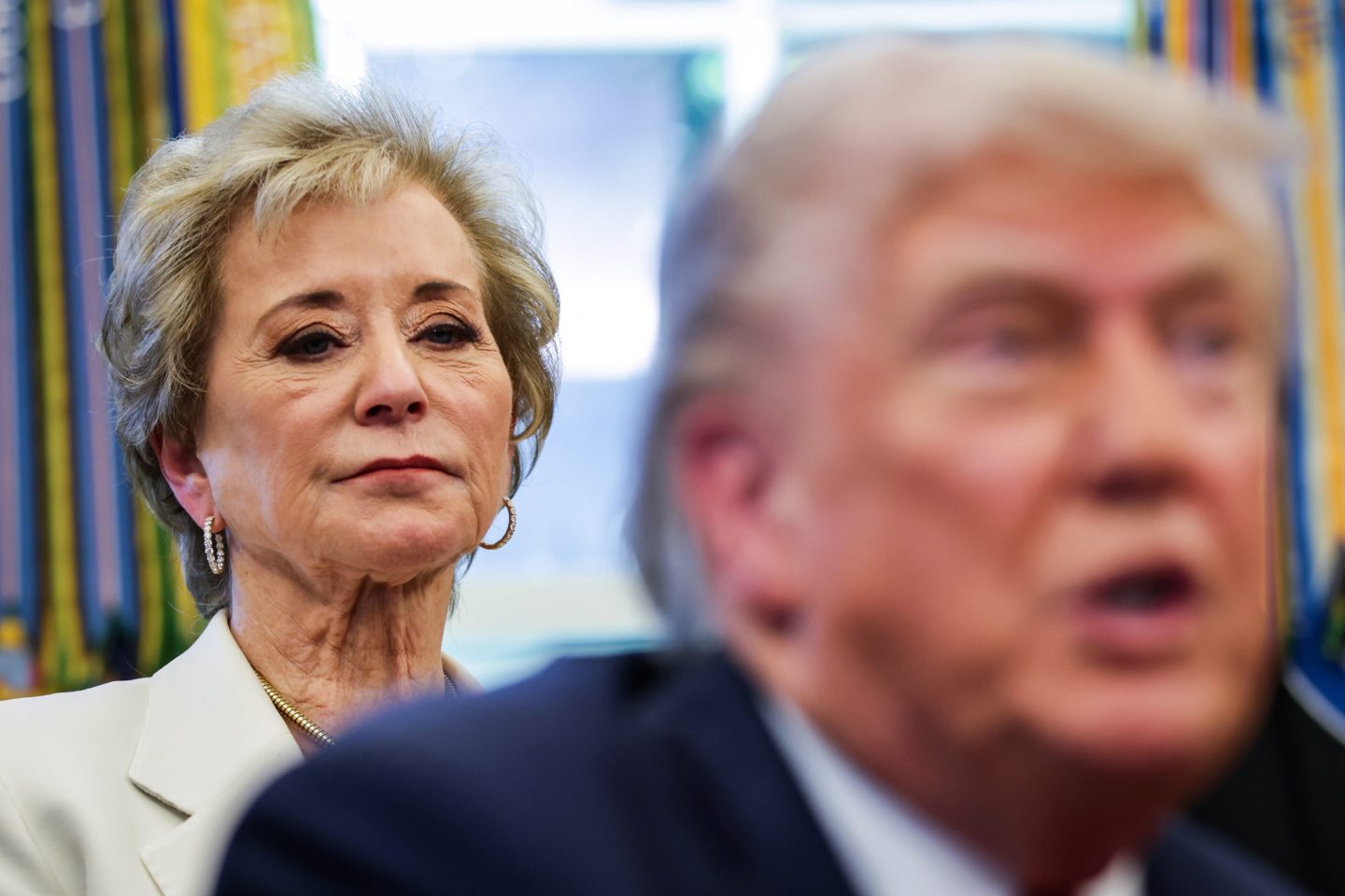 Education Secretary Linda McMahon stands behind Donald Trump