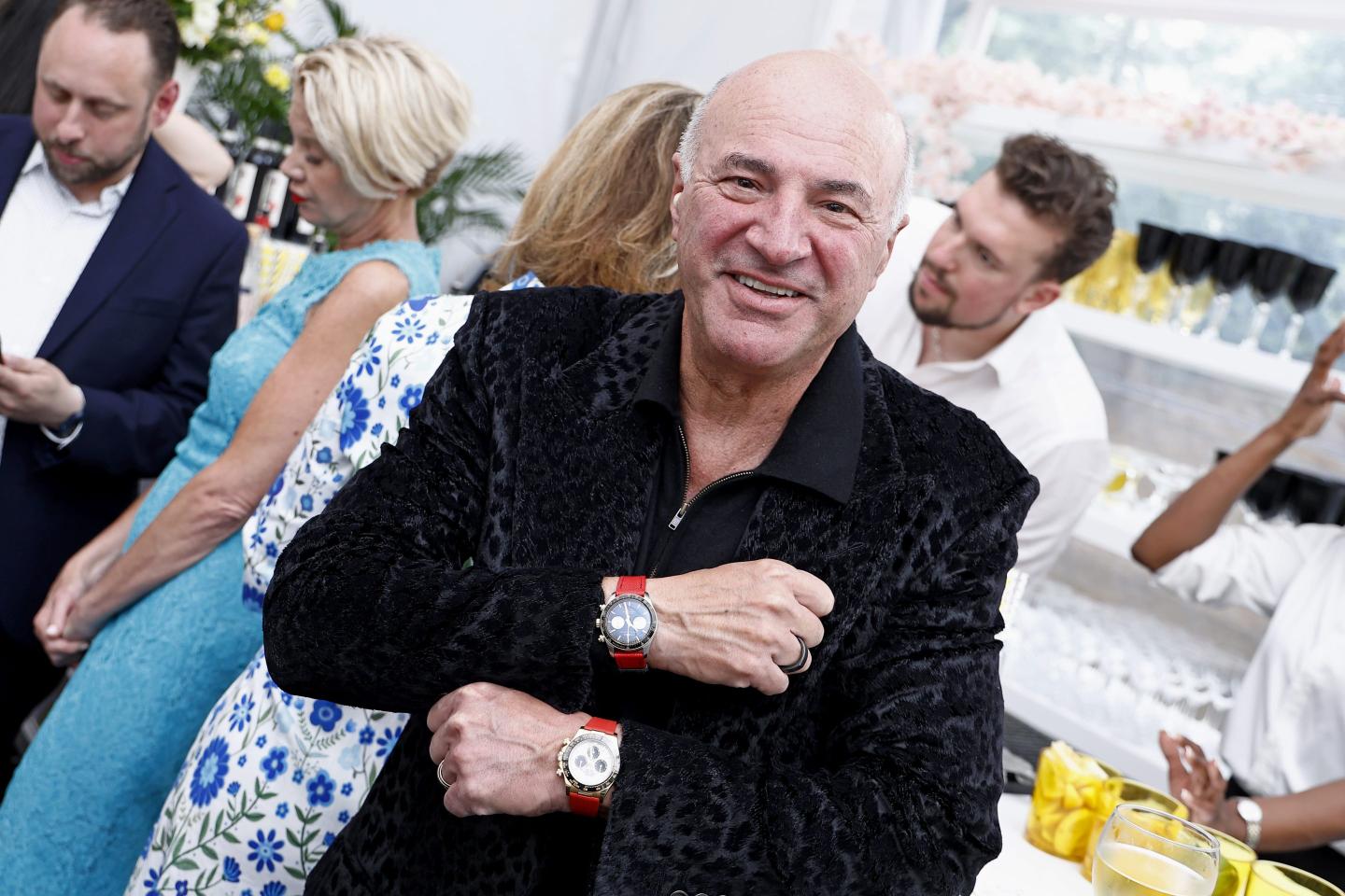 Kevinn O'Leary showing off his watches