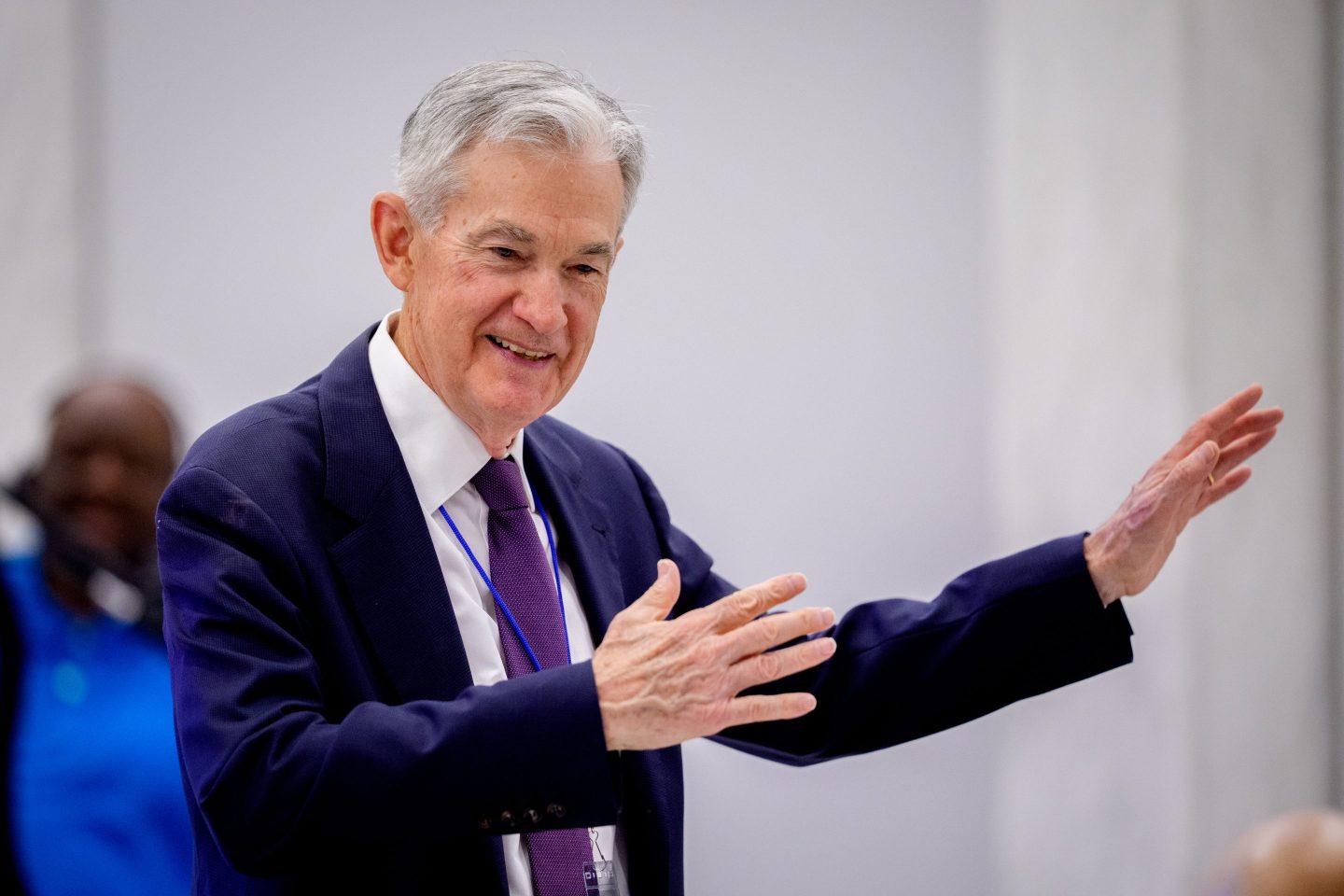 Federal Reserve Chair Jerome Powell talks to guests as he arrives to speak at the Thomas Laubach Research Conference held by the Federal Reserve Board of Governors on May 15 in Washington, DC.