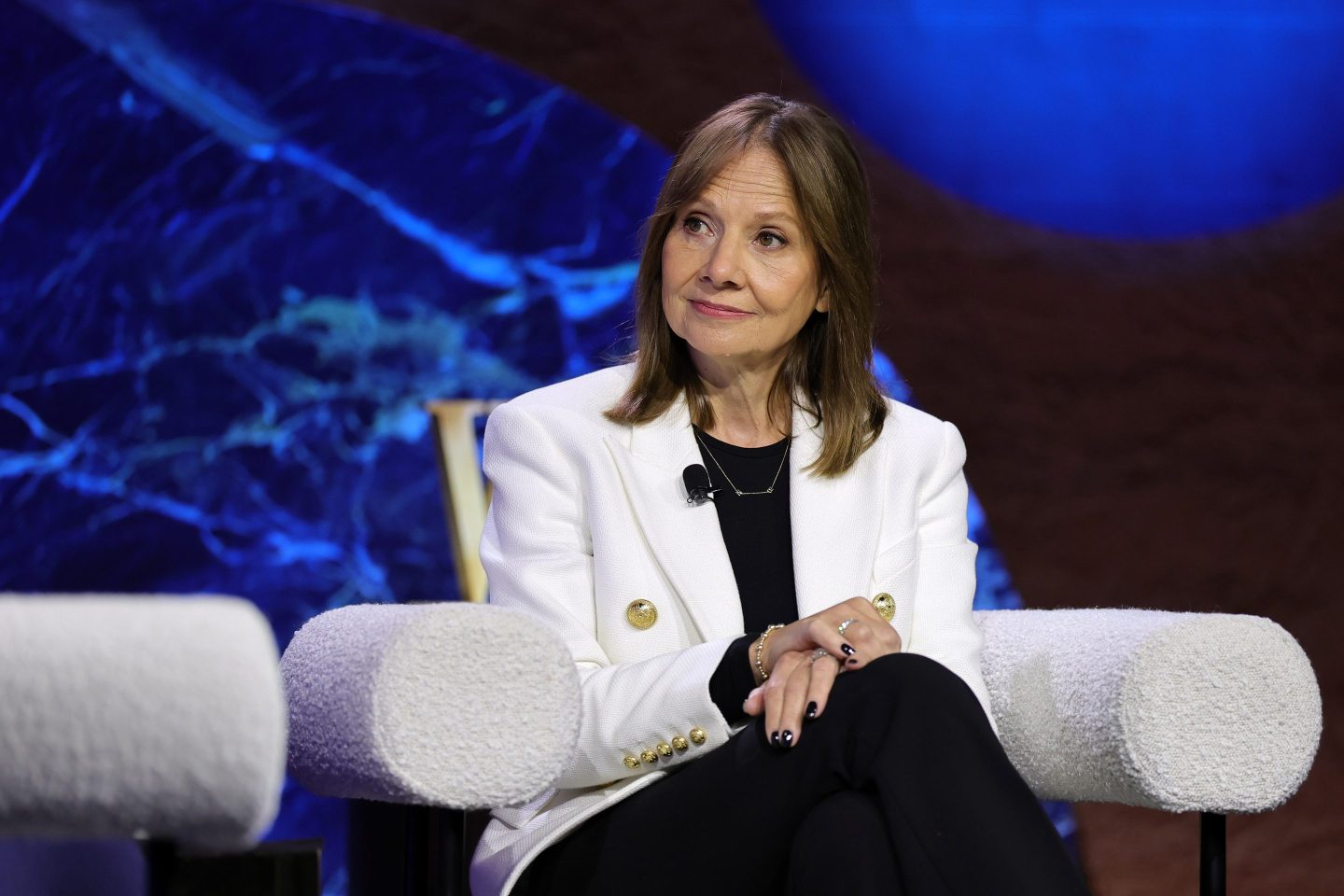 General Motors CEO Mary Barra listens during a live Wall Street Journal interview.
