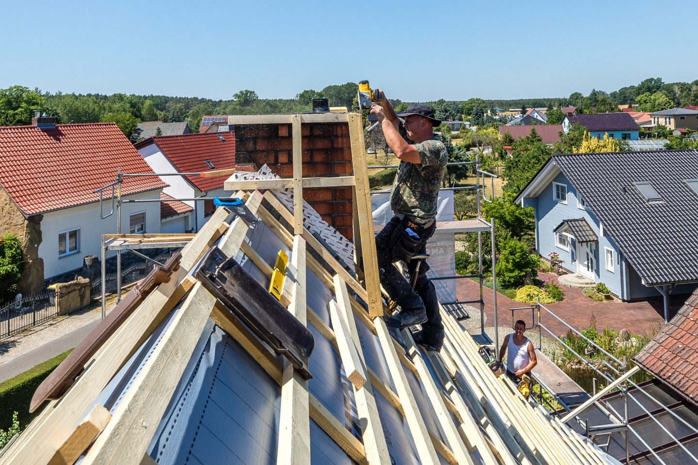 A roofer working on a roof