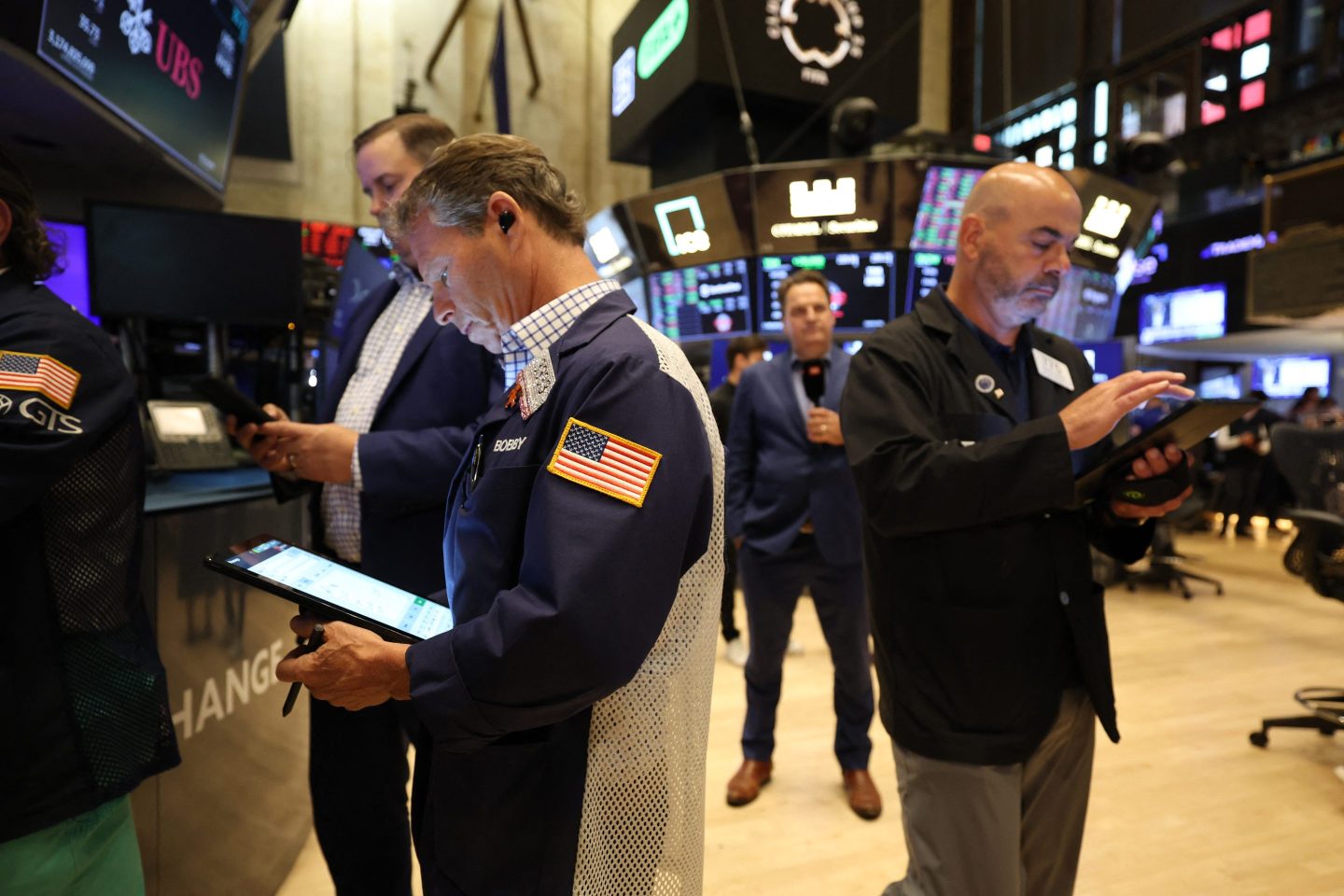 Traders on the floor of the New York Stock Exchange on Friday.