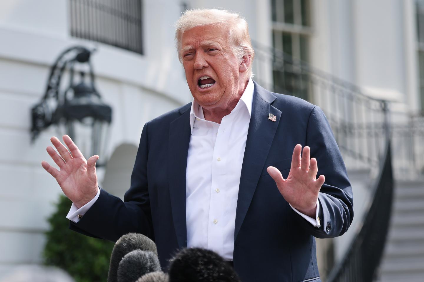 Photo: WASHINGTON, DC - JULY 11: U.S. President Donald Trump answers questions while departing the White House on July 11, 2025 in Washington, DC. Trump is scheduled to travel to Central Texas today to meet with first responders and local elected officials involved with the recovery process from last week's flash flooding event that has claimed more than 120 lives. Photo by Win McNamee/Getty Images