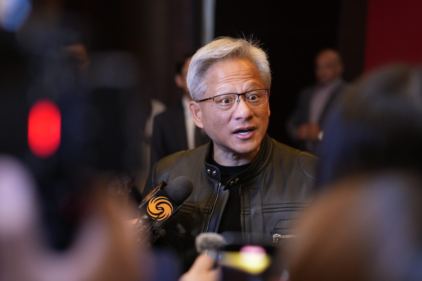 Jensen Huang, co-founder and CEO of Nvidia, speaks with the media before attending the welcome dinner of the third China International Supply Chain Expo (CISCE) on July 15, 2025 in Beijing.