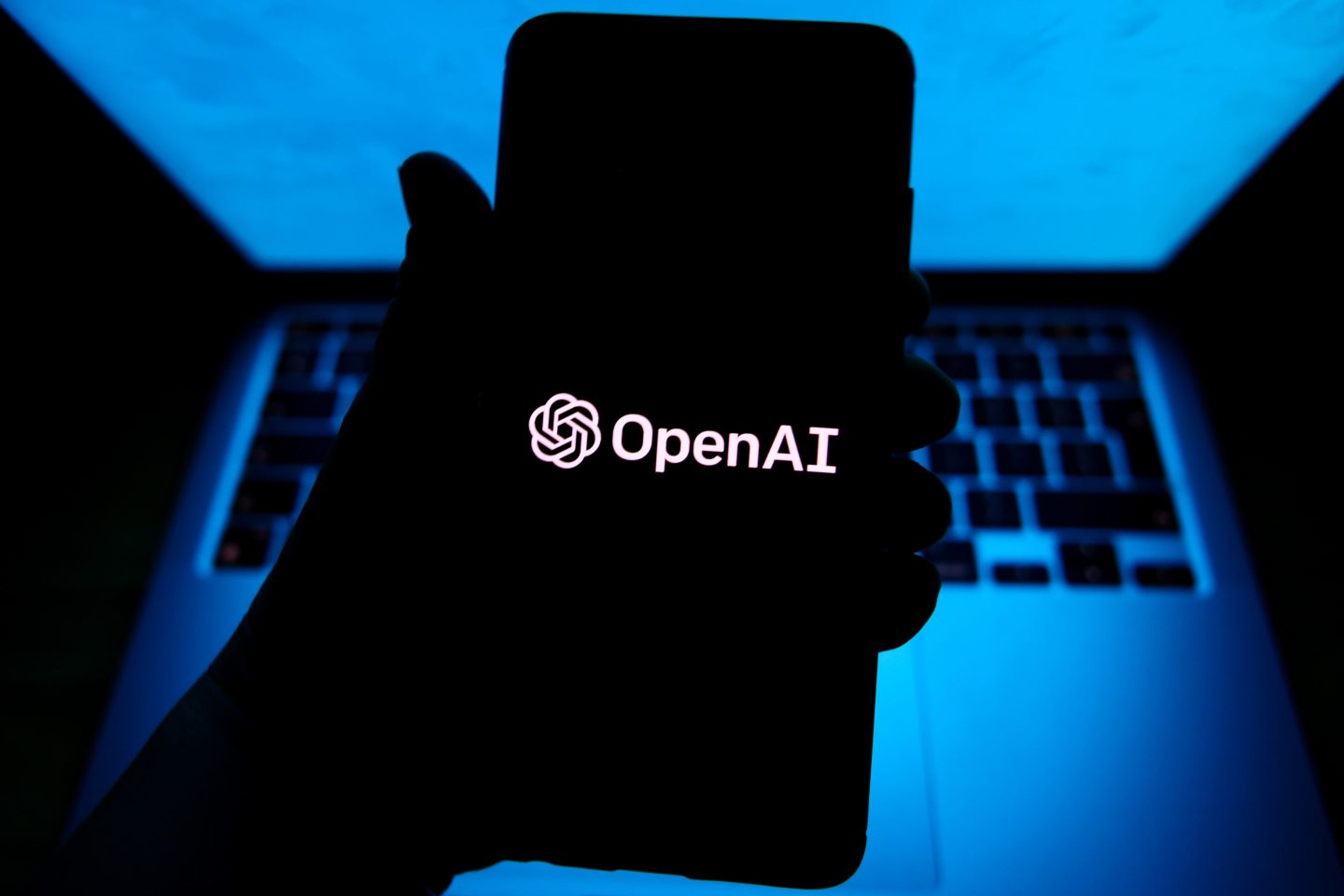 OpenAI logo on a phone screen.