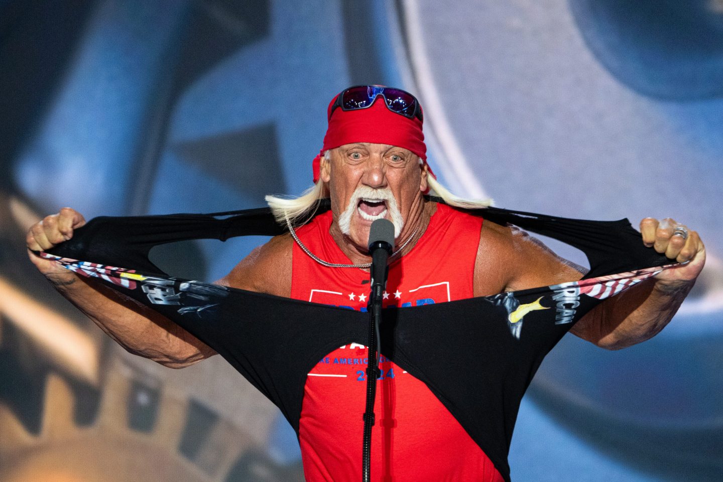 Hulk Hogan rips his shirt off