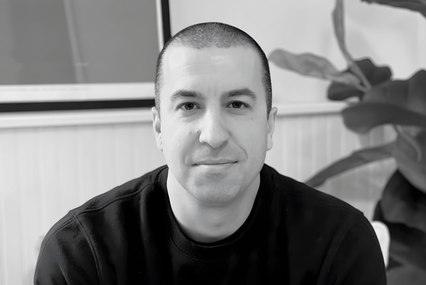 A headshot of Ryan Bozarth