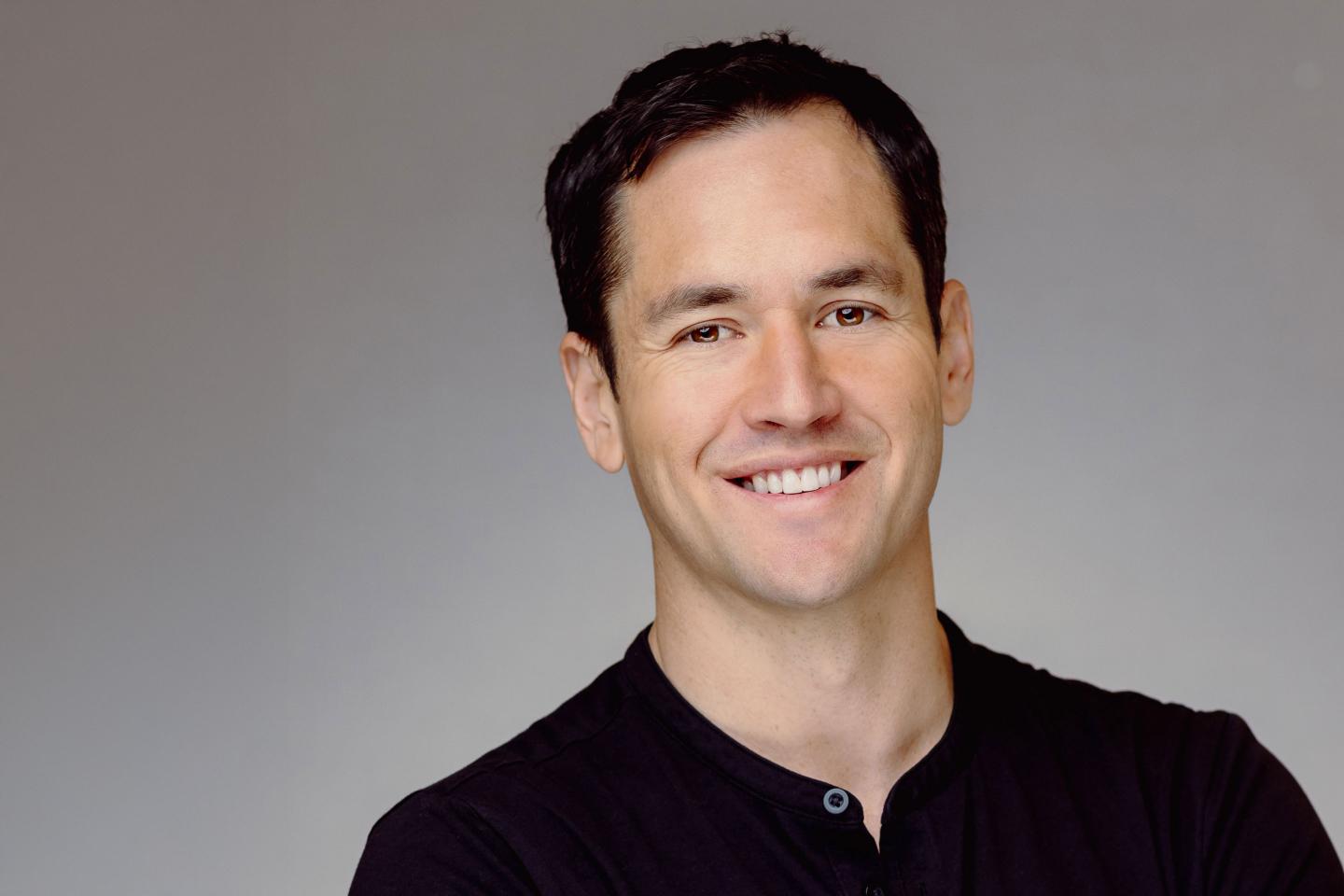 Life360 co-founder Chris Hulls in a black shirt.