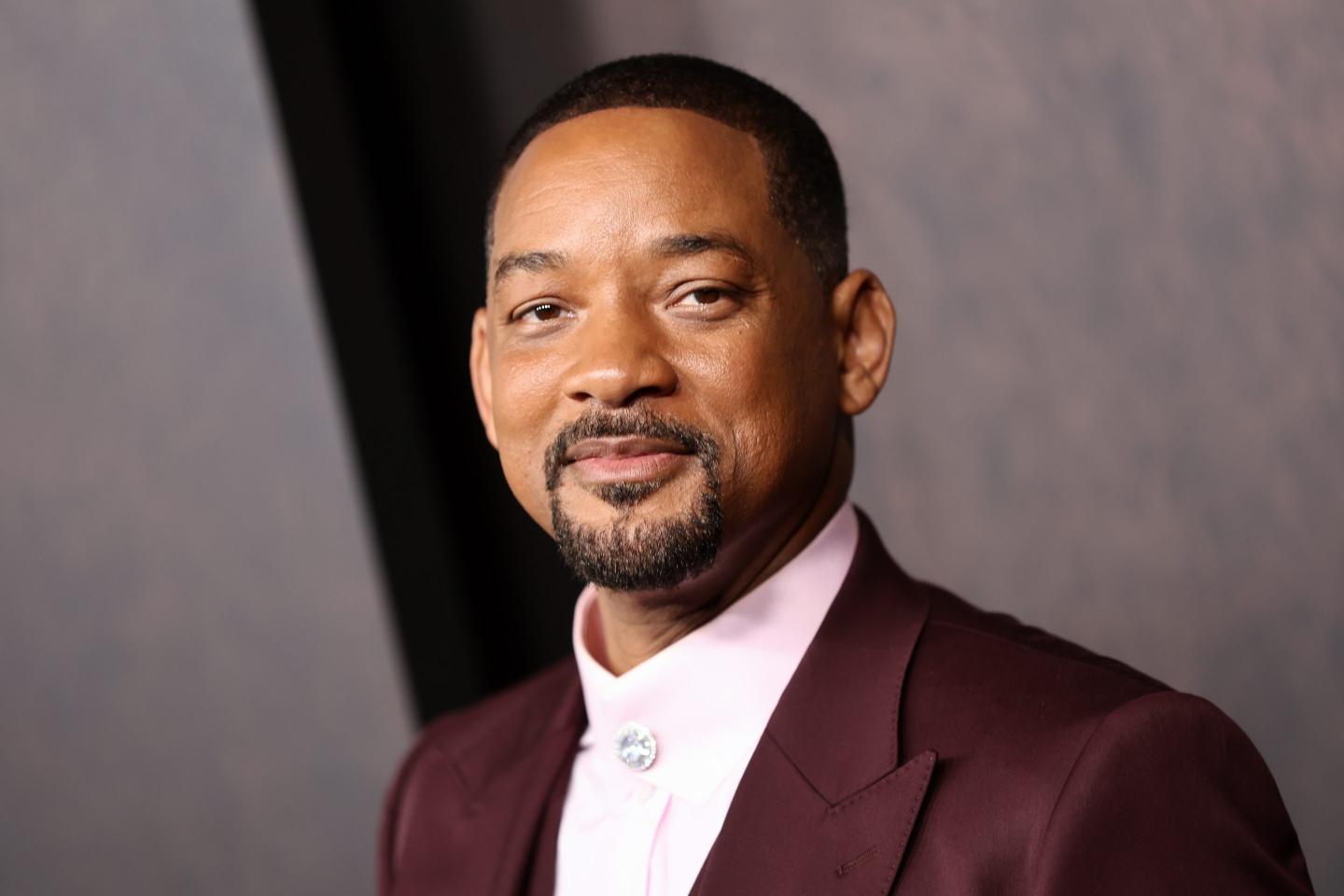 Will Smith smiles