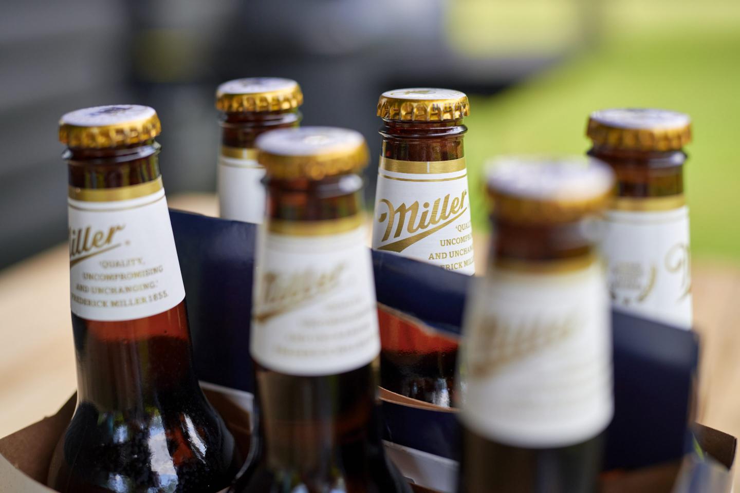 A six-pack of Miller Lite beer bottles