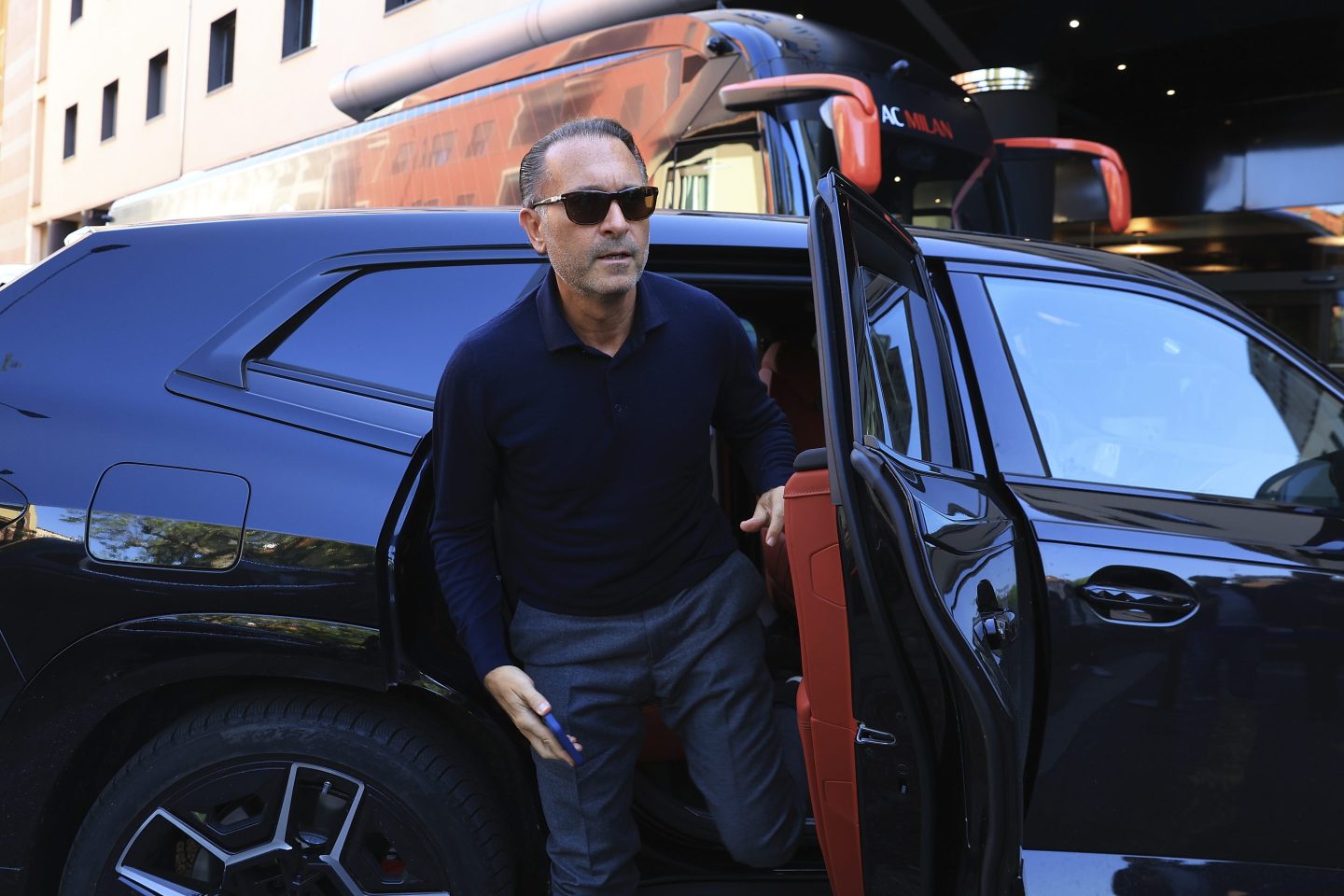 Gerry Cardinale stepping out of a car