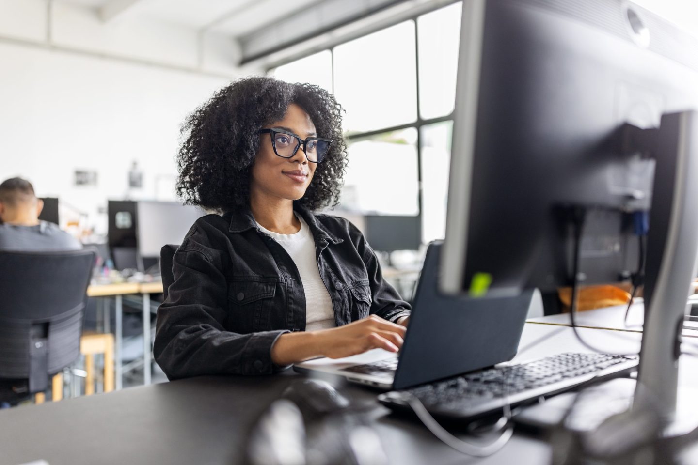 Business woman working at a computer